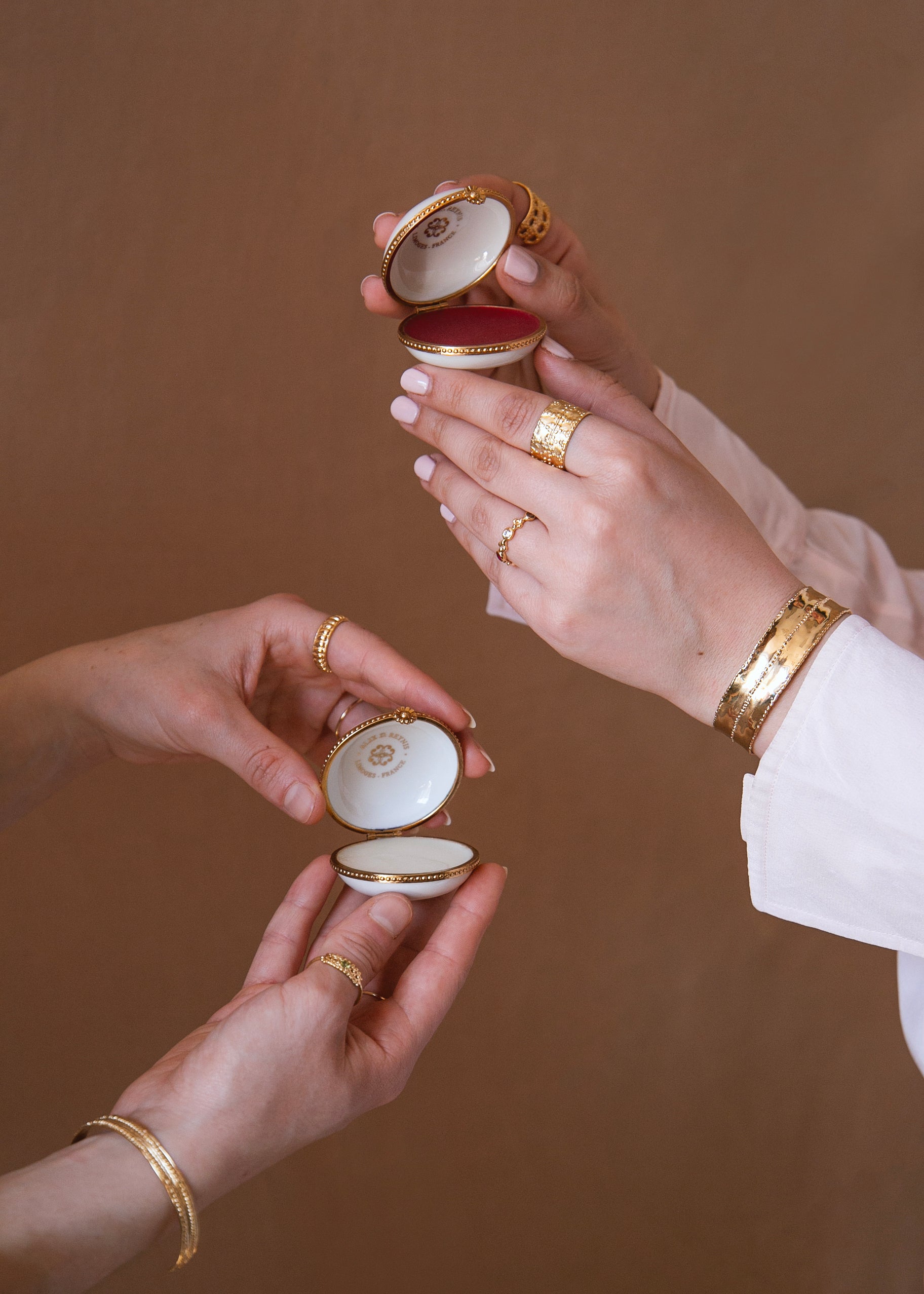 White porcelain pillbox set in brass