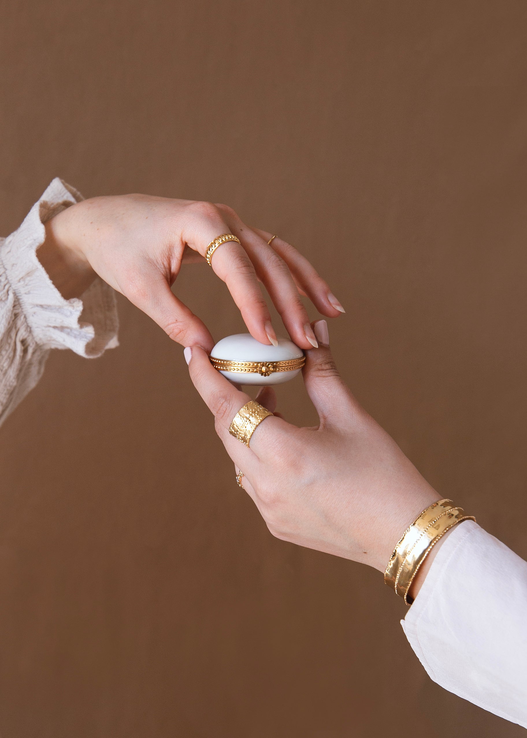 White porcelain pillbox set in brass