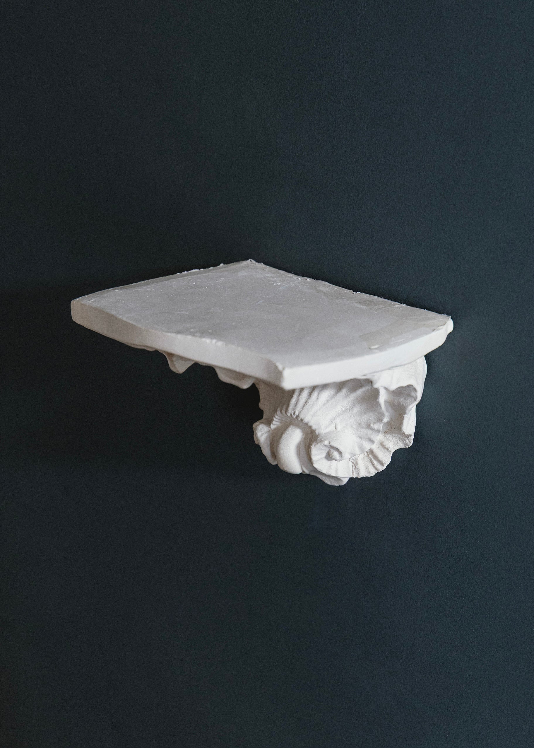 Scrolled plaster console