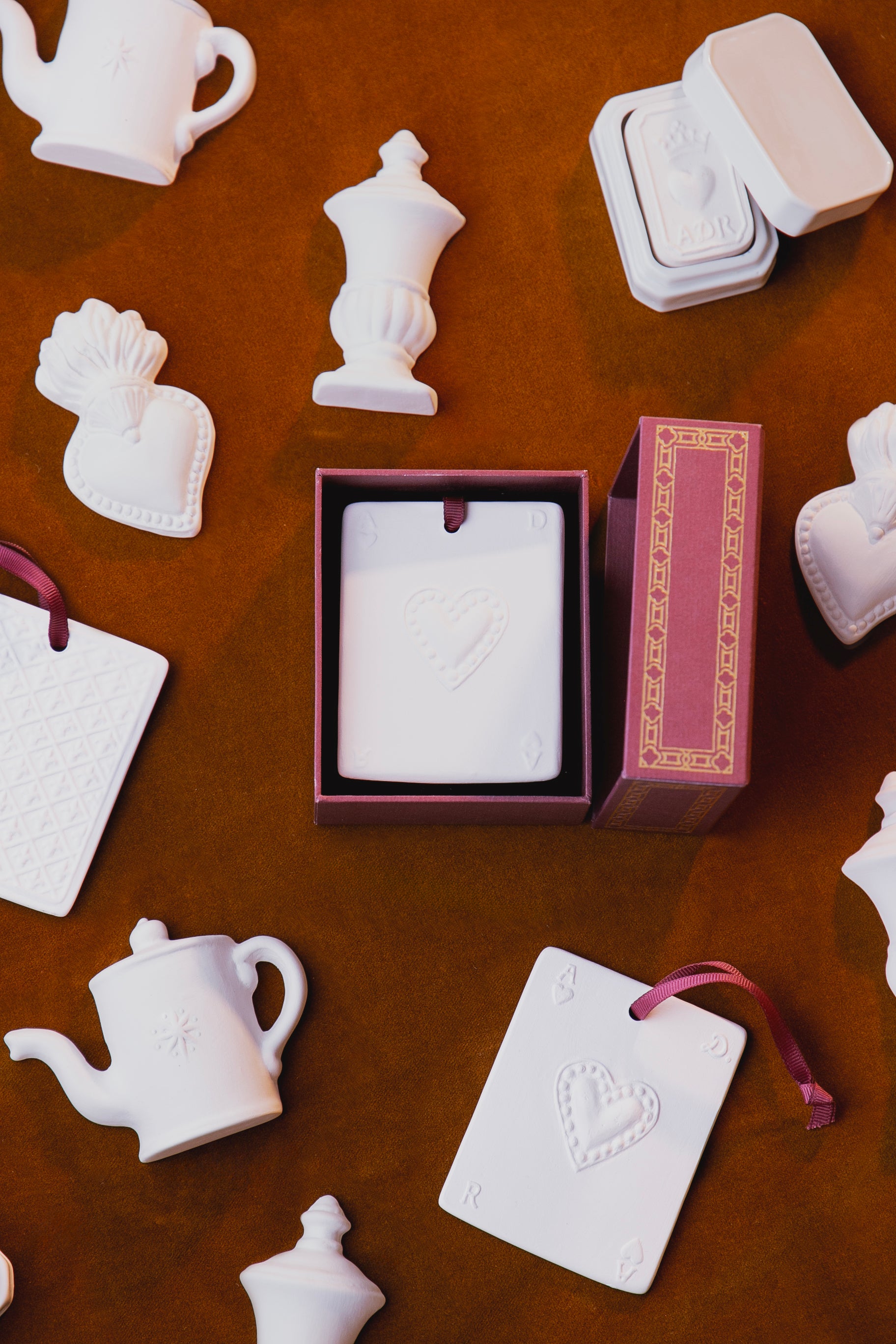 Ace of Hearts scented sculpture and its perfume concentrate