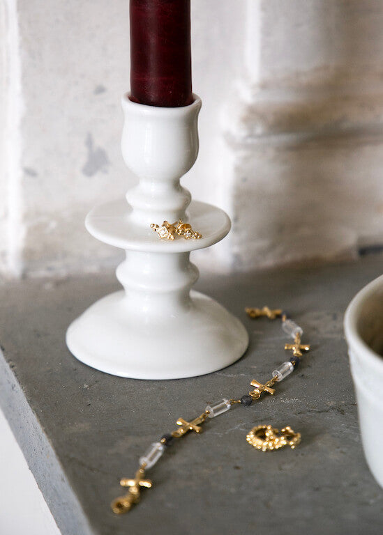 Disk candle holder in white porcelain