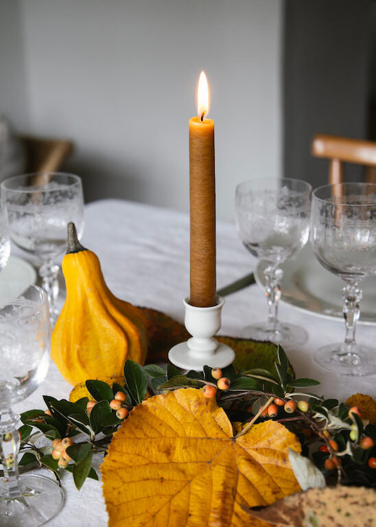 Disk candle holder in white porcelain