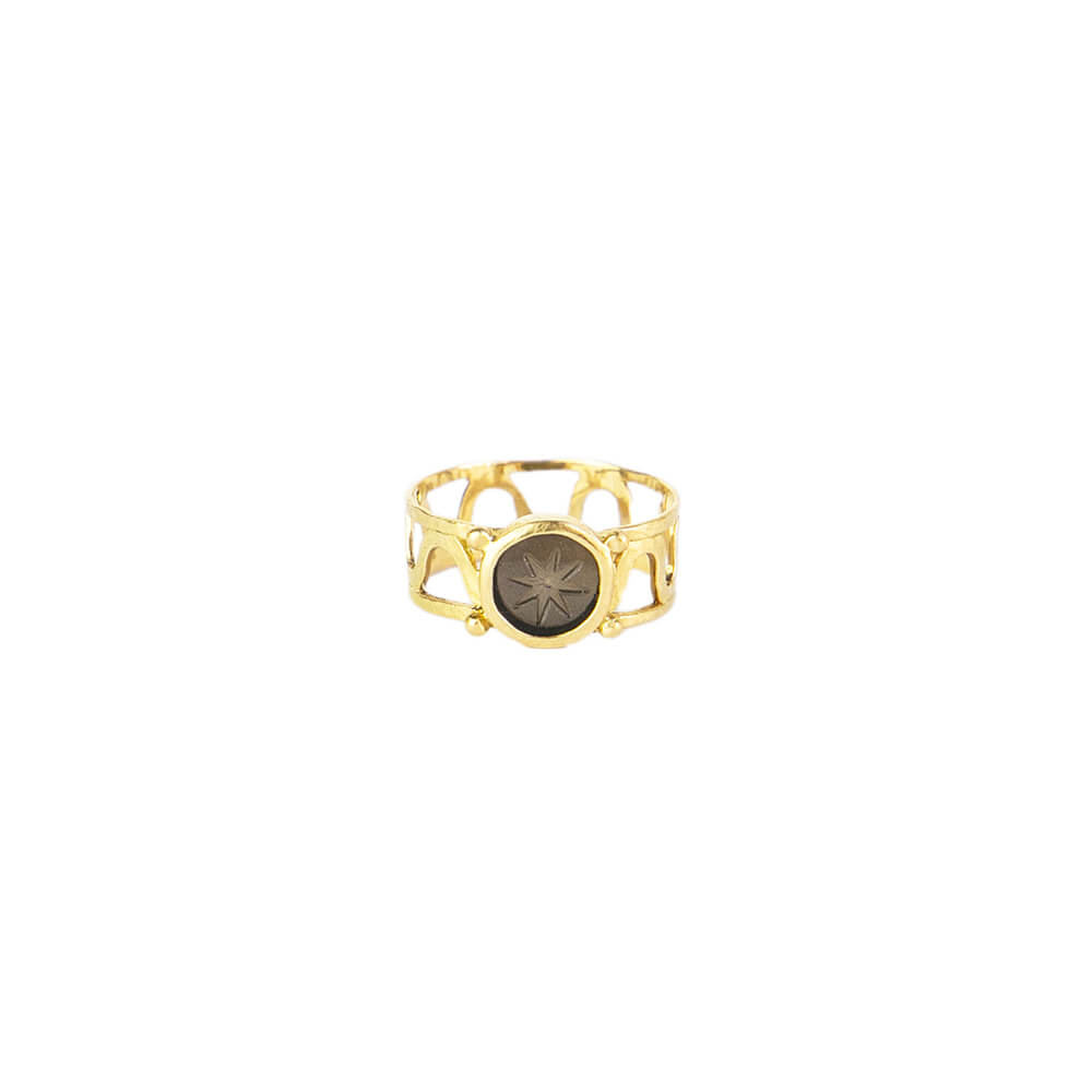 Arès 18-karat gold and black onyx intaglio ring