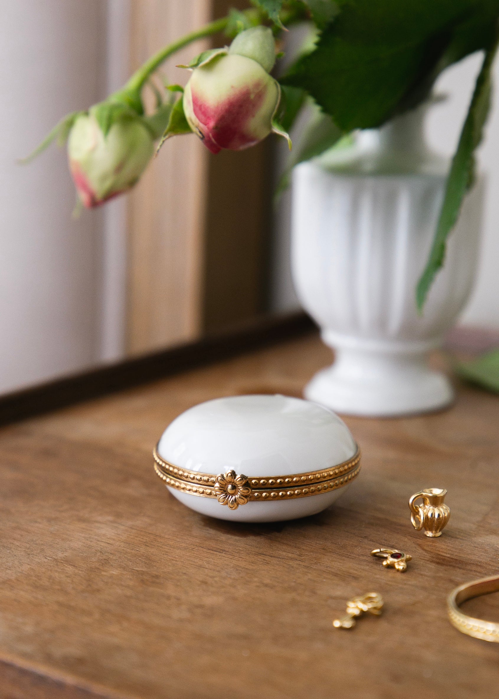 White porcelain pillbox set in brass