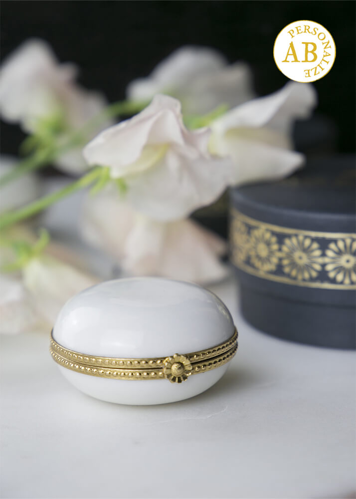 White porcelain pillbox set in brass