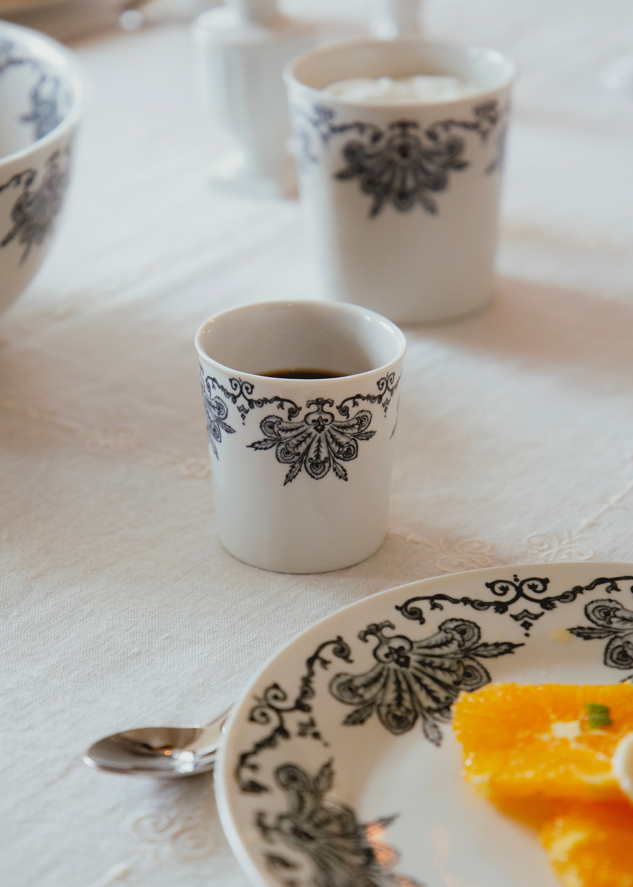 Plume white porcelain coffee tumbler